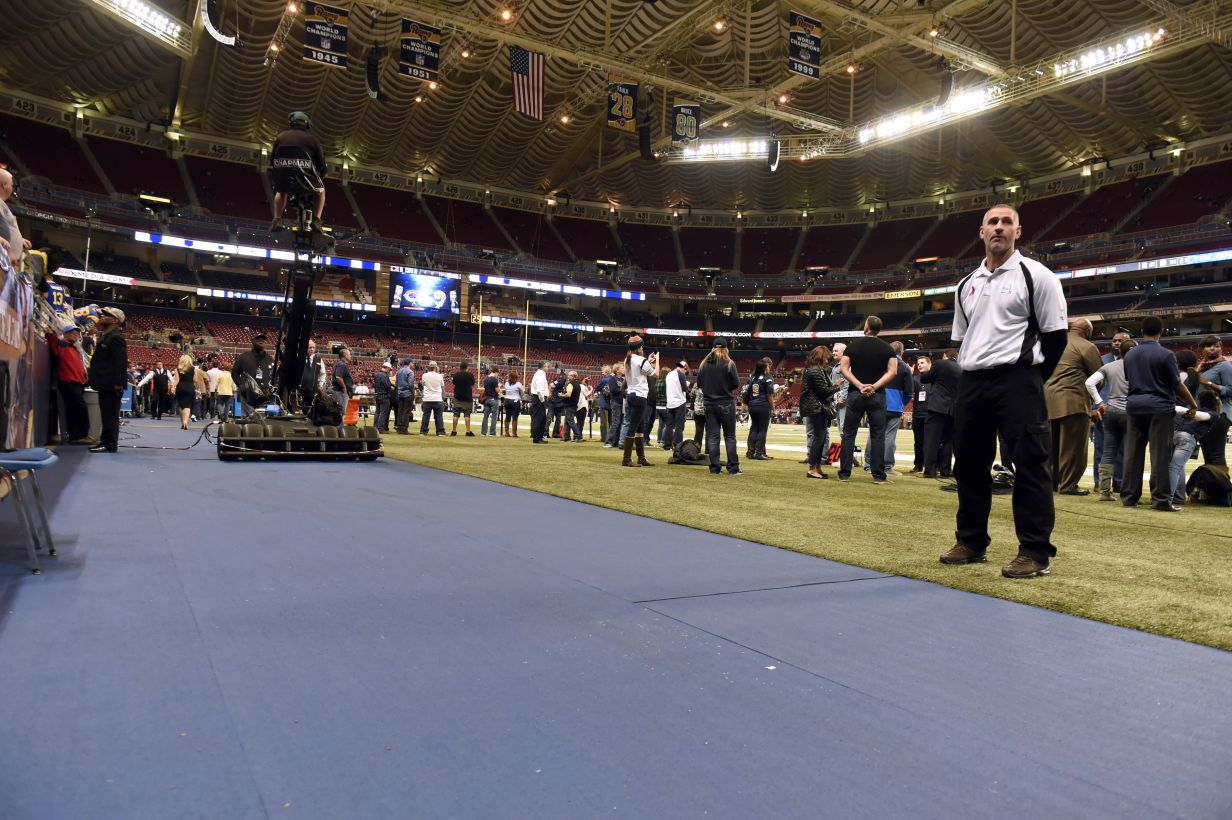 New slip-resistant surface inside Edward Jones Dome before the start of an NFL football game Nov. 15, 2015